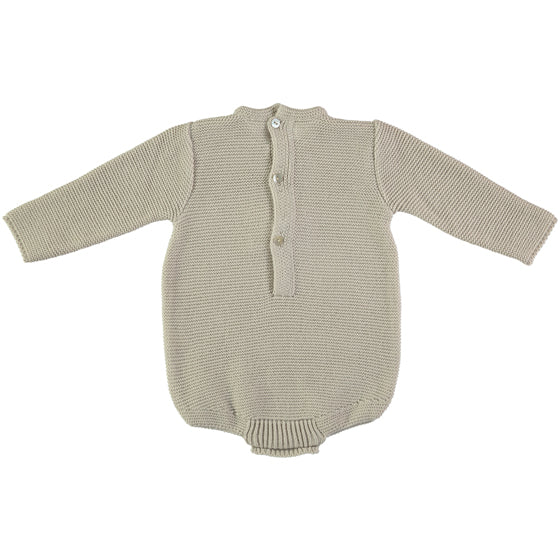 Classic style baby grow in cream colour with small pompom. Made in Spain.