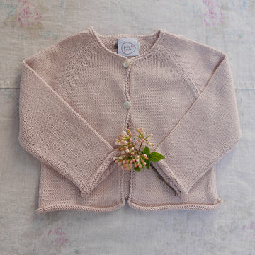 Pink baby cardigan with pompoms