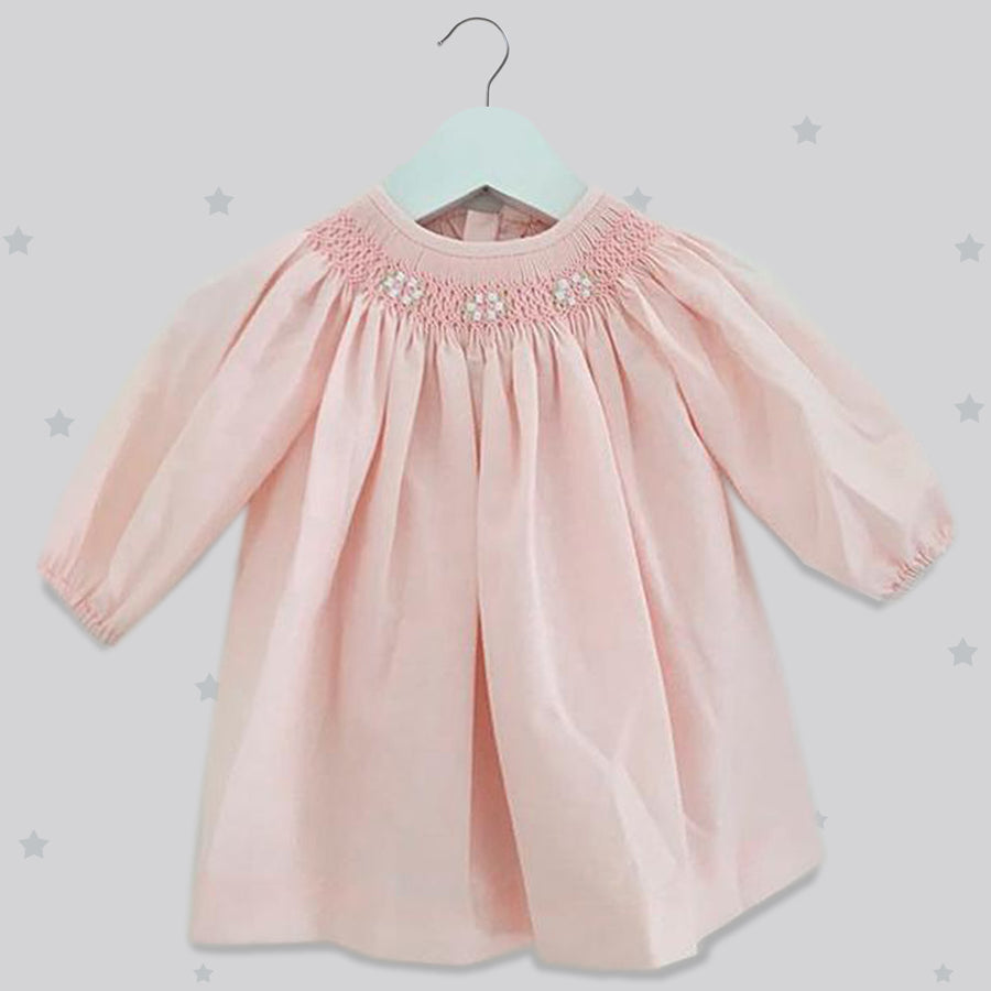 Soft pink handsmocked girls dress